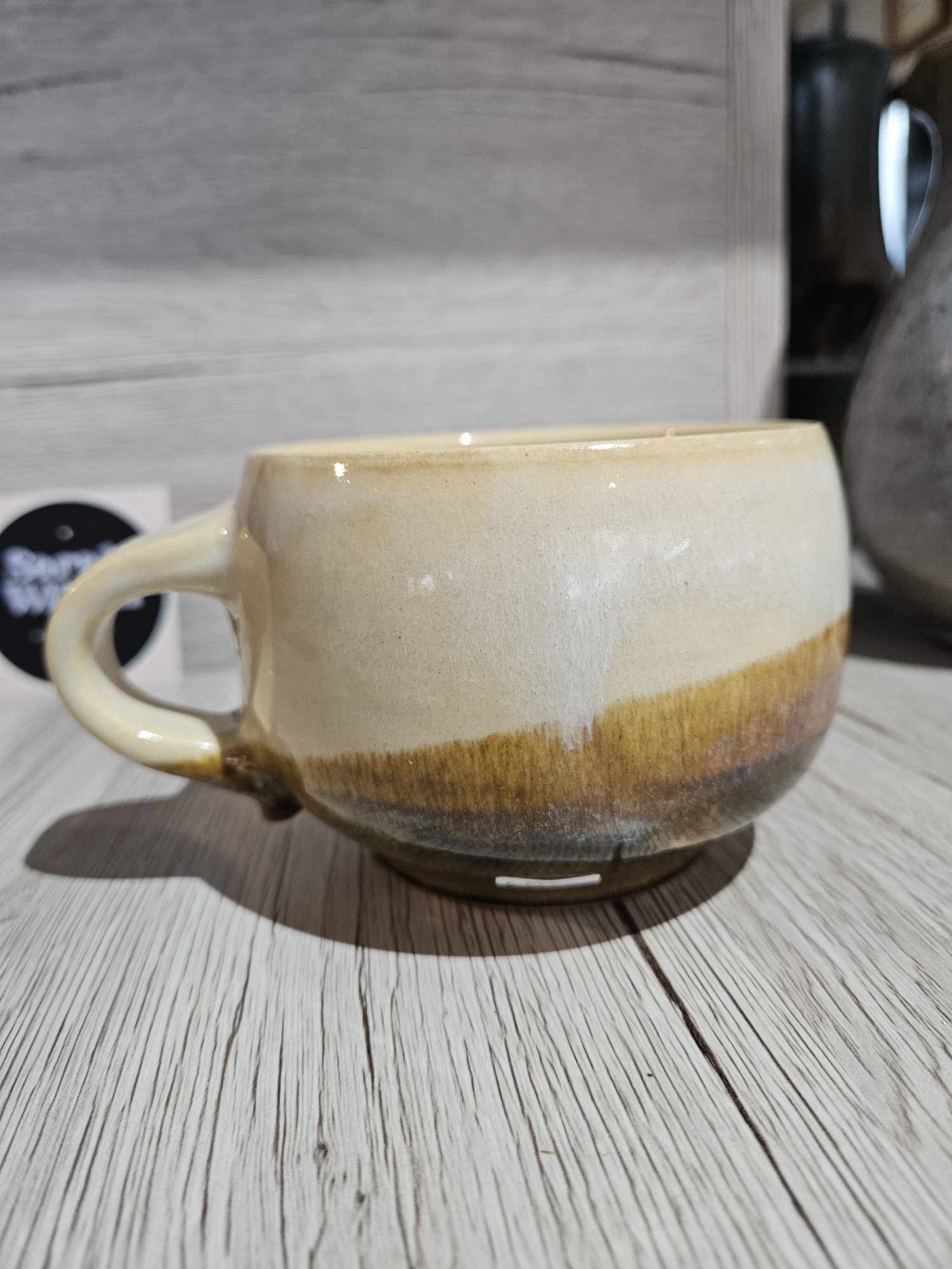round short pottery mug peach ladysmith